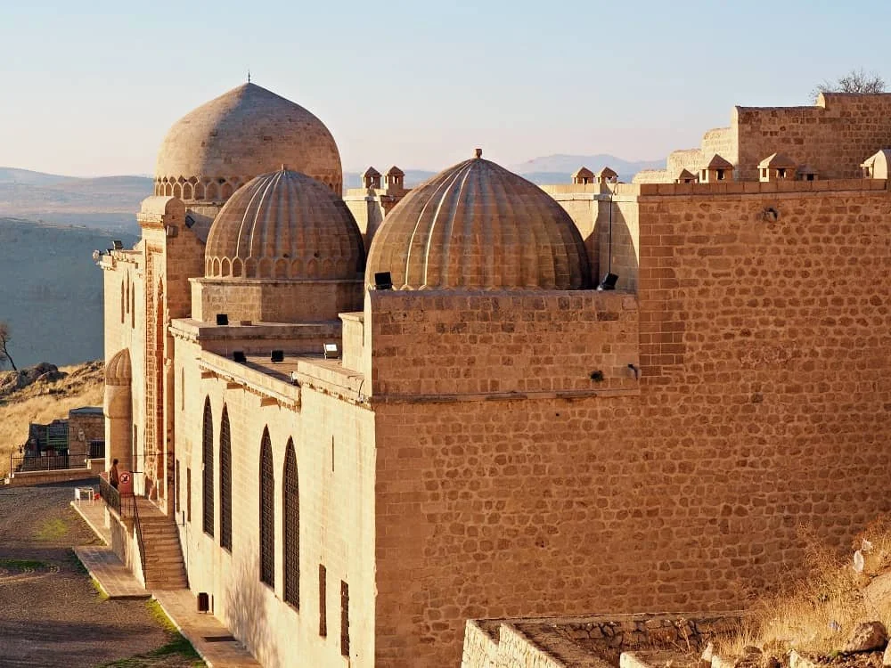 sunset on the domes of Kasimiye Madrasa in Mardin