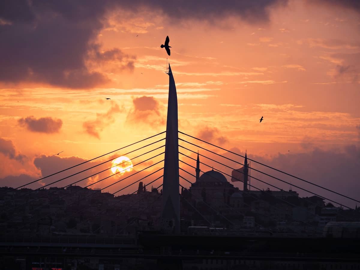 14 day travel itinerary turkey Sunset over a mosque and a bridge in Istanbul, 10 days turkey itinerary