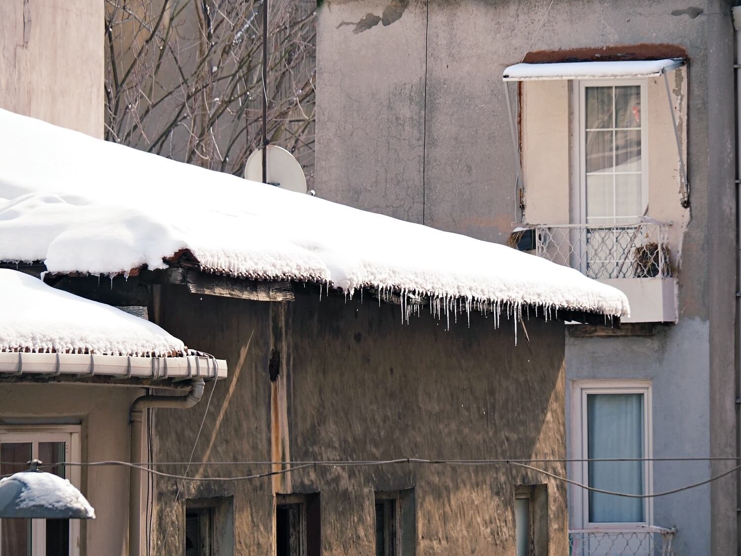 Snow and icicles on the roof of a house in Cihangir in Istanbul during winter
