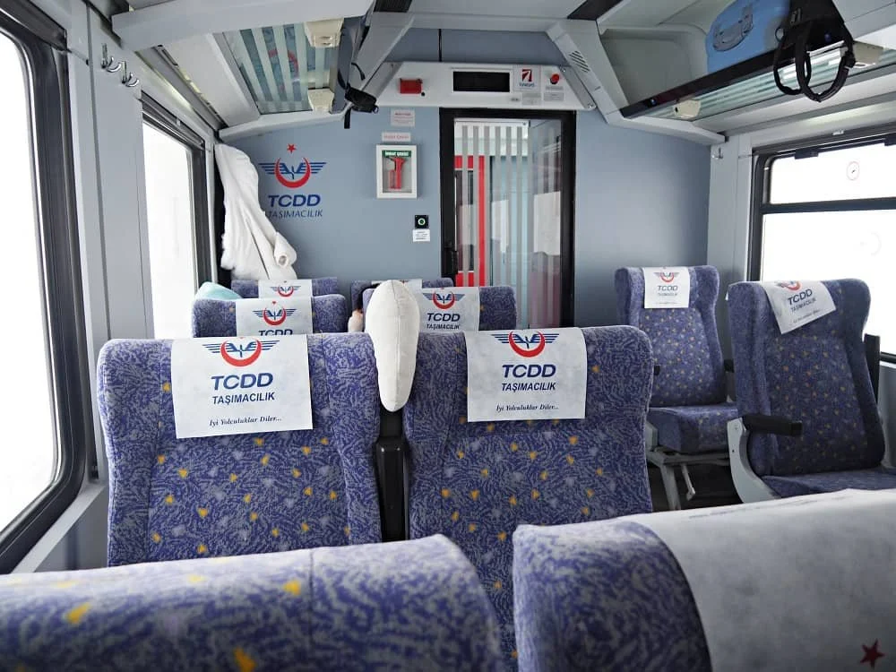 Rows of Pullman seats inside the regular Dogu Express train, eastern express ankara to kars