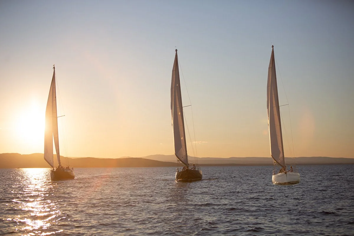three boats sailing towards btv.jpg