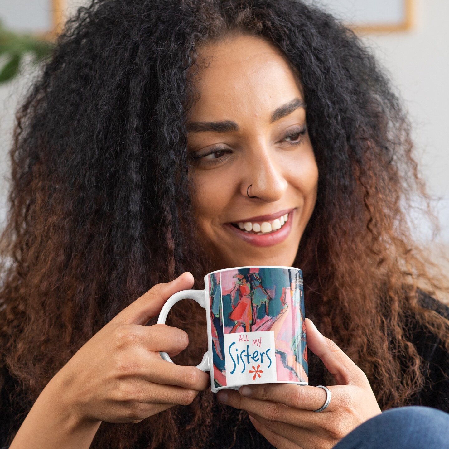 mockup-of-a-curly-haired-woman-with-an-11-oz-mug-in-her-hands-33174.jpg