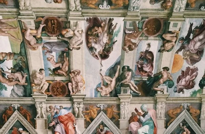 The ceiling of the Sistine Chapel. This was painted by Michelangelo at the turn of the 16th century.