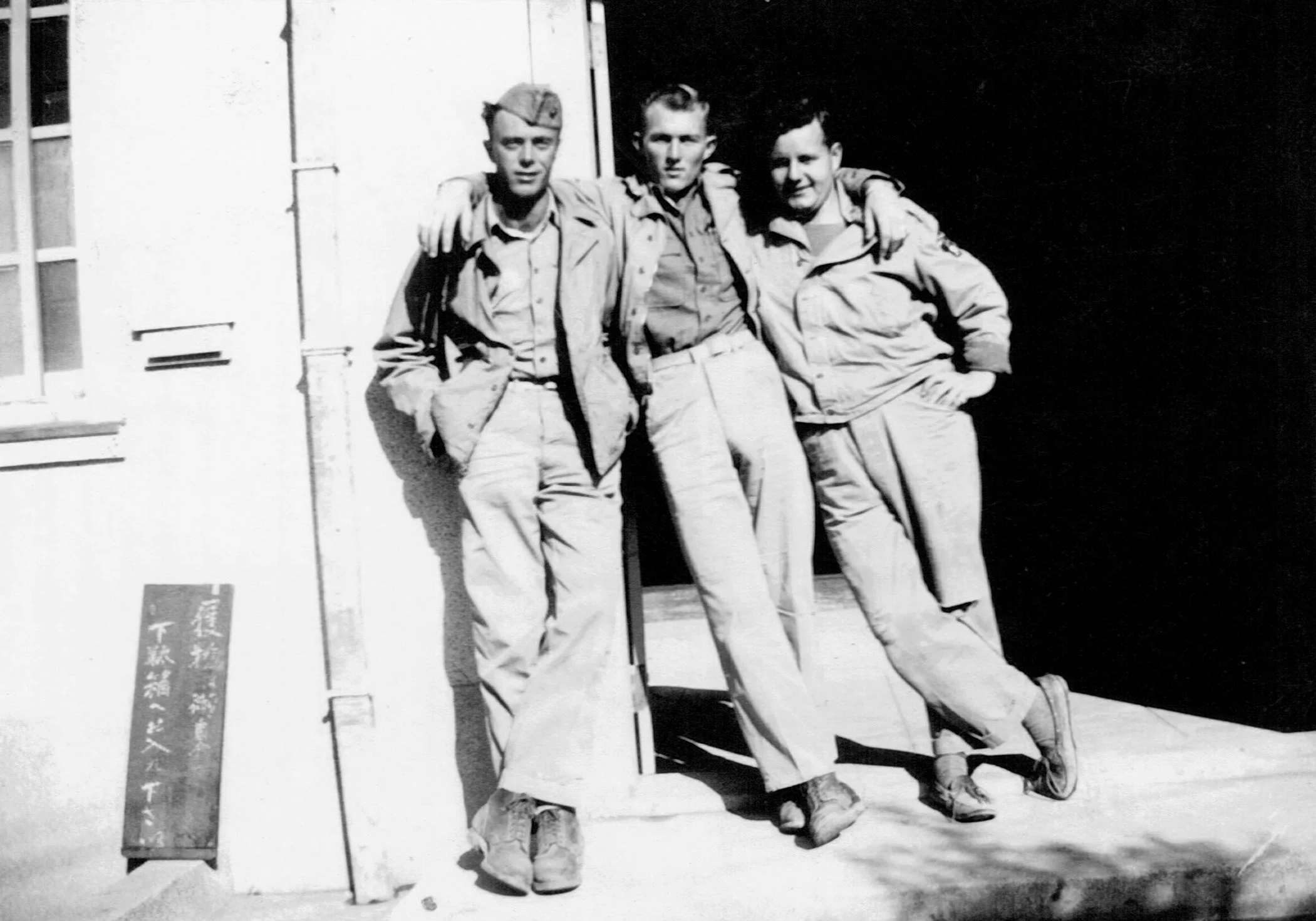 William (center) with Marine buddies in Miyazaki, Japan, 1945.