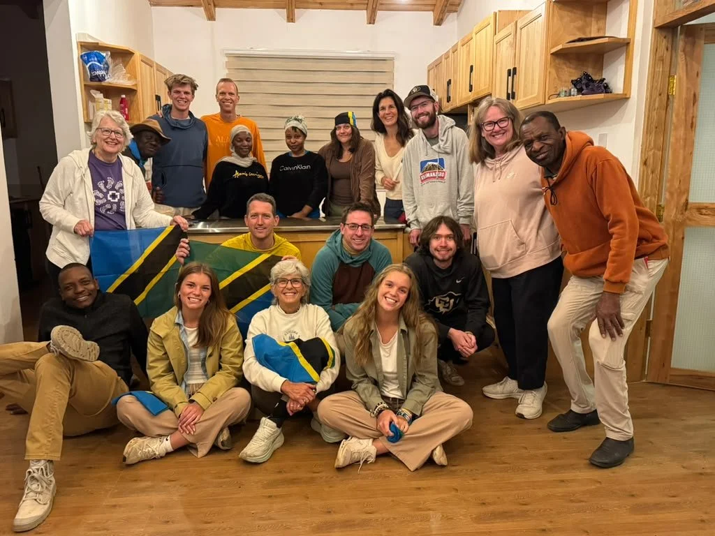 Group picture with meal crew at Maasae.JPG