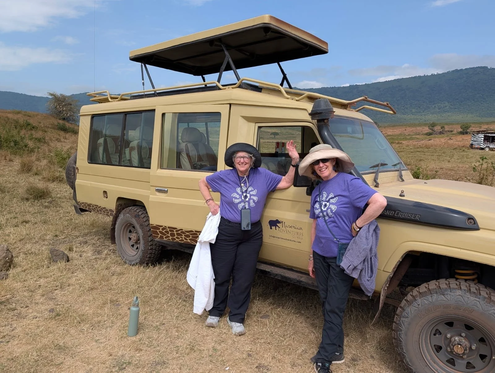 Linda and Terri wearing matching 5k shirts.JPG