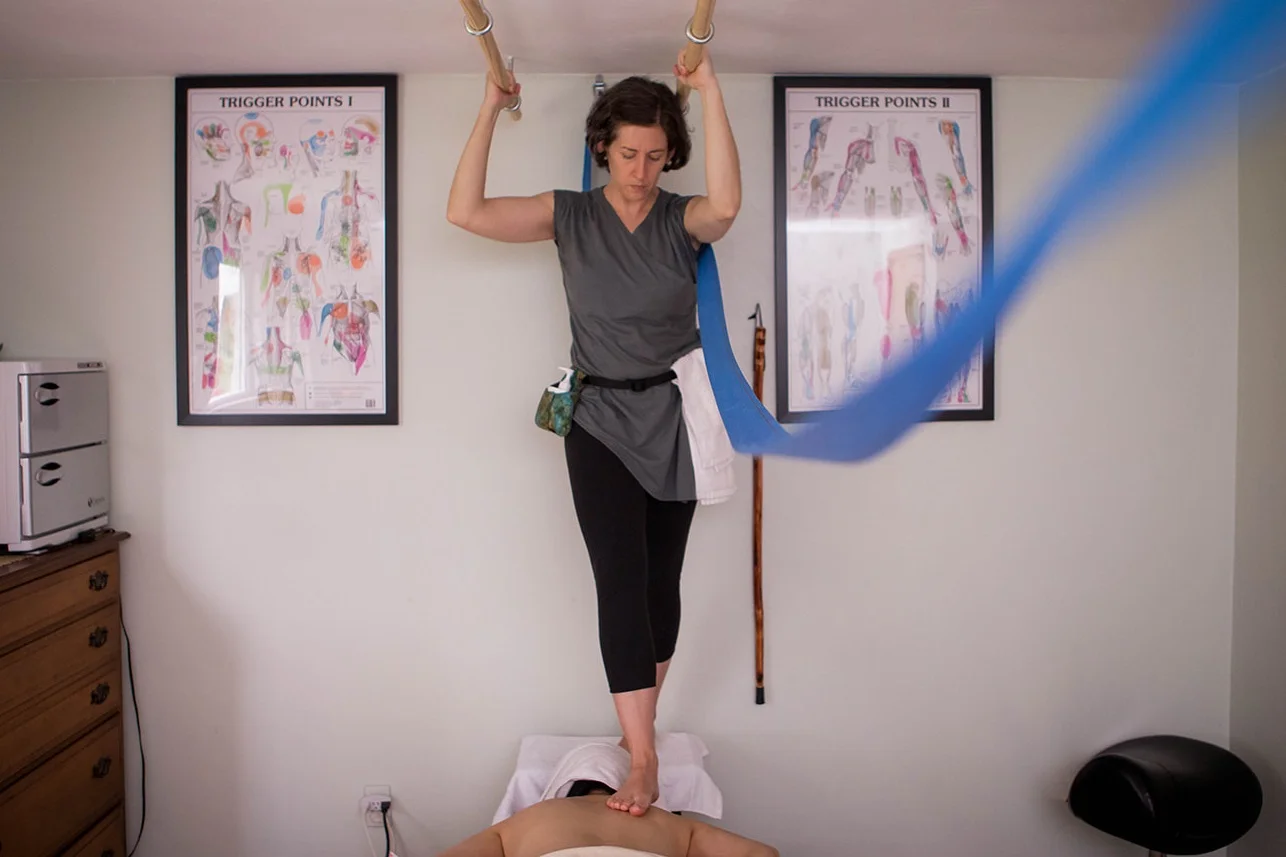 One of my clients enjoying an ashiatsu barefoot massage in my private practice.