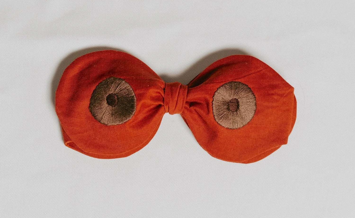 Amber Skin Boobie Bowtie