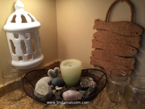 candle in wire basket