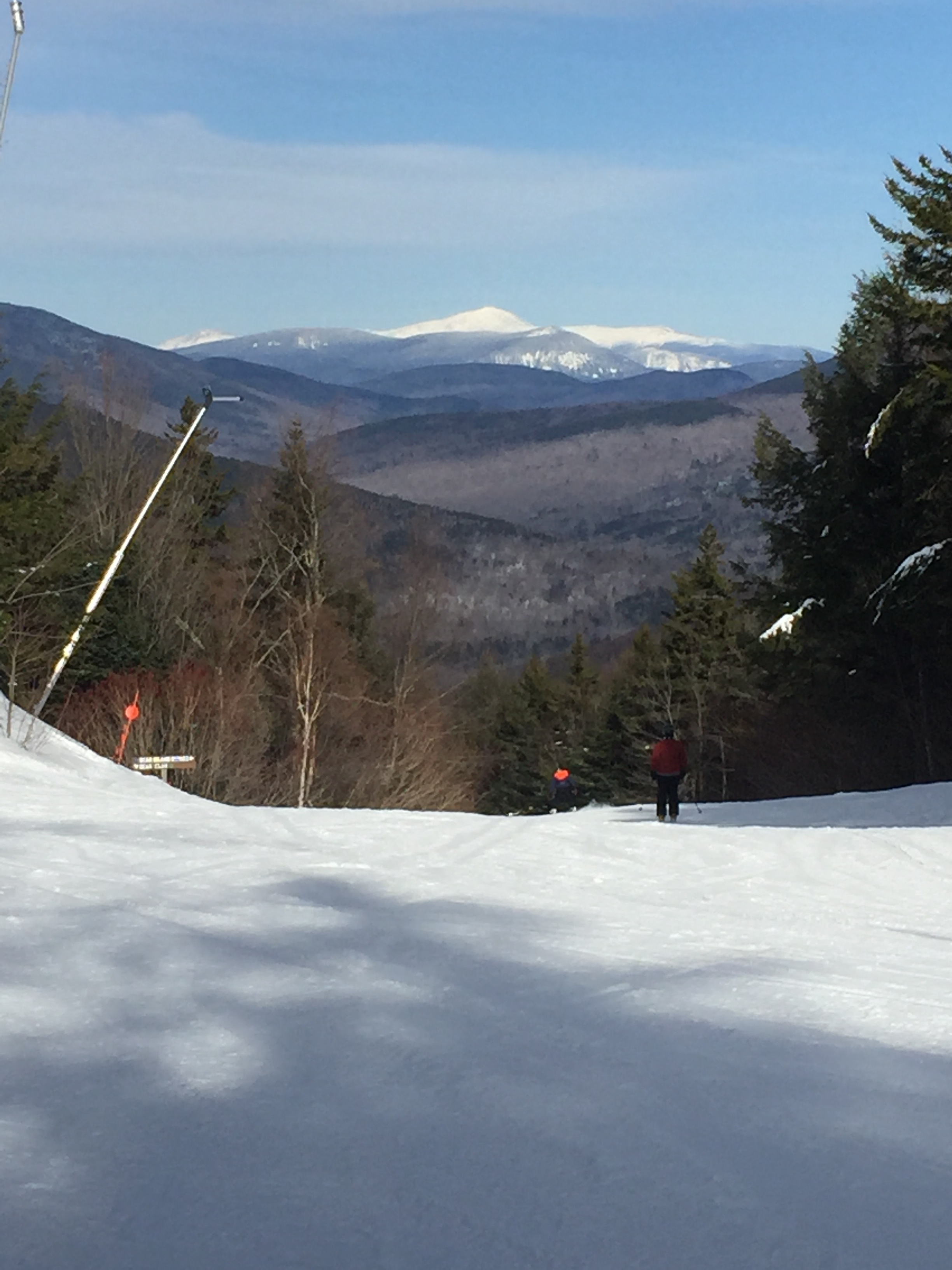 From the summit of Loon Mountain, white capped, 6,288-foot high Mt. Washington in the distance. Mt. Washington’s conditions today: 8 degrees F with 53 mph wind. Not gusting… solid 53 mph wind speed.