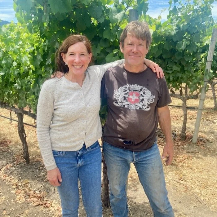 man and woman in vineyard