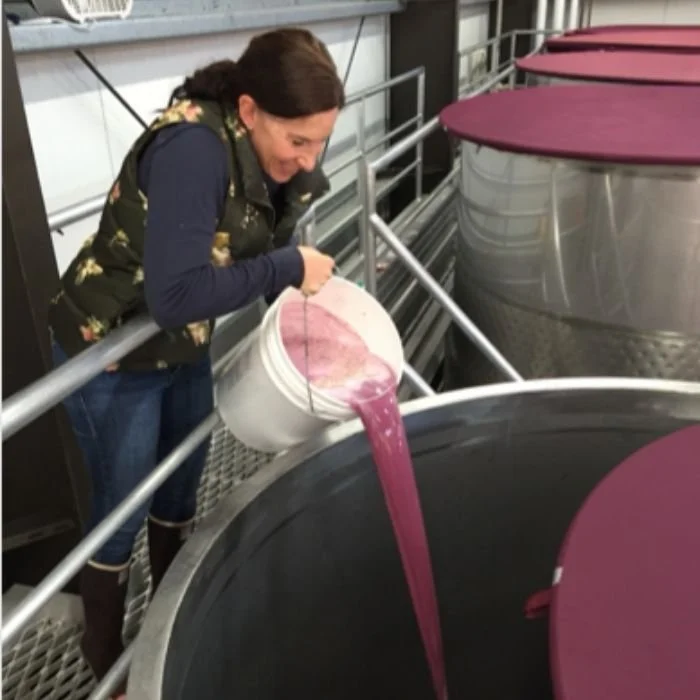 ADDING YEAST TO A WINE TANK