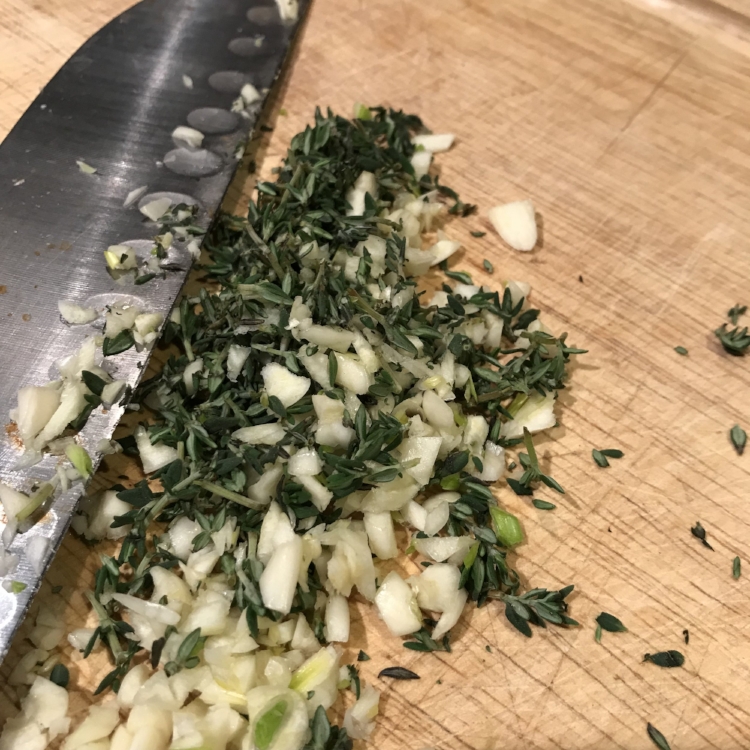 oh, nothing, just chopping garlic and thyme and wanting to eat it all raw... you?