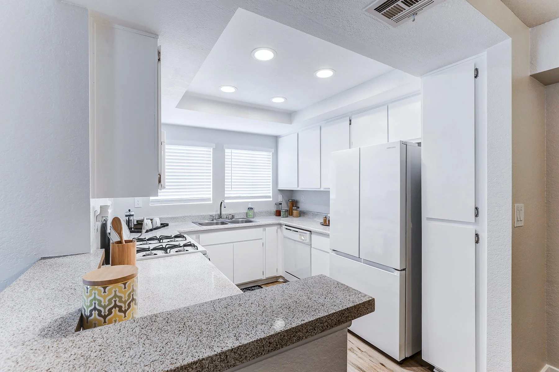 A two-bedroom model unit at Villagio, this image shows the kitchen. 
