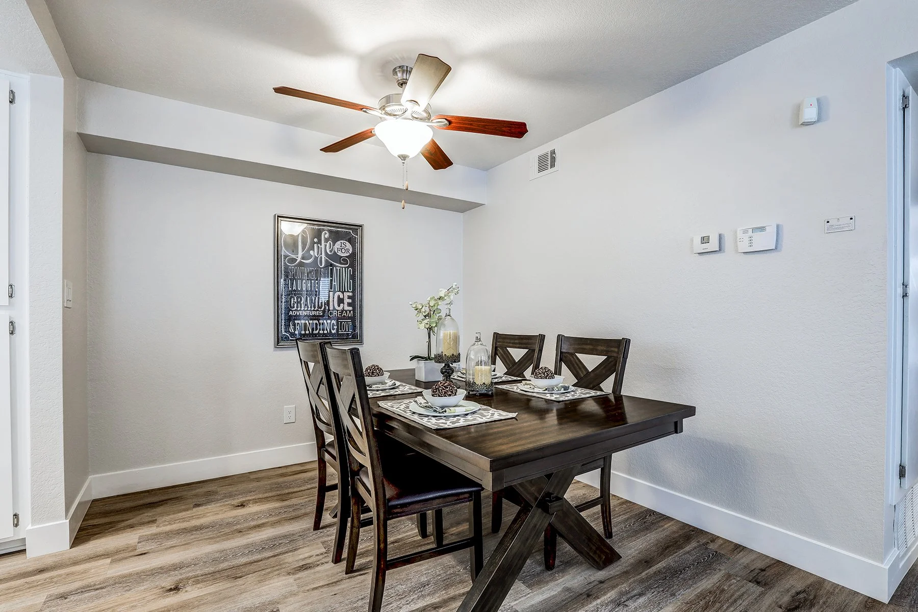 A two-bedroom model unit at Villagio, this image shows the dining room. 