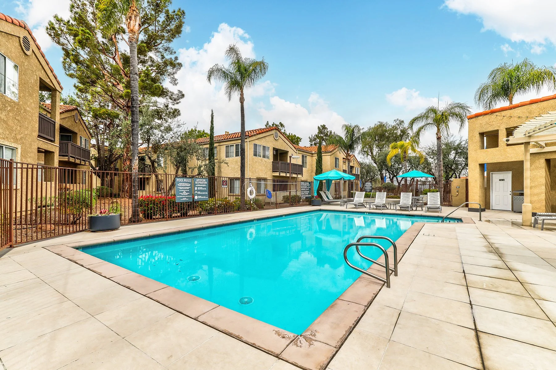A beautiful sunny day capturing the dazzling swimming pool at Villagio