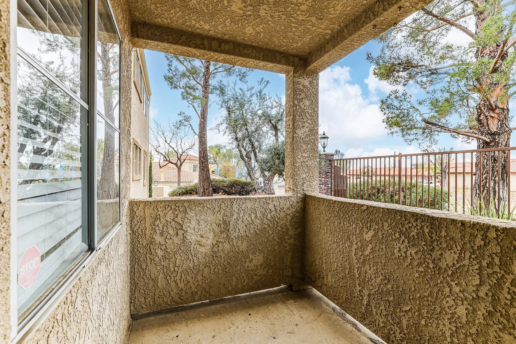 A two-bedroom model unit at Villagio, this image shows the private patio. 