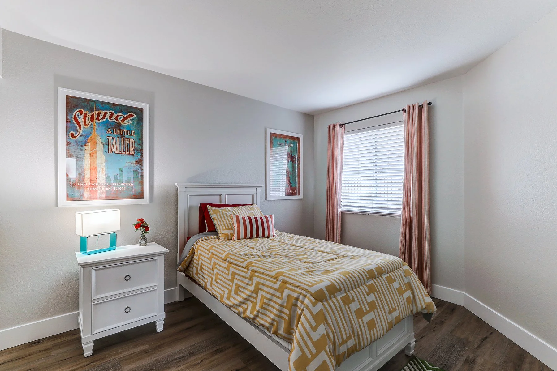 A two-bedroom model unit at Villagio, this image shows bedroom two. 