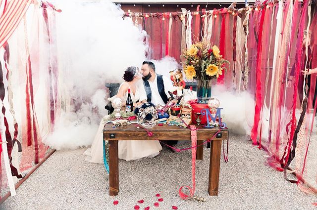 Magical! That is the ONLY way to describe this whimsical wedding! Our sweetheart table is PERFECT for the bride and groom to get cozy 😘 thank you for letting us be a part of your wedding! 📸: @norina_kaye
Wedding planner @paulinacluteevents
Venue @legendsranchlasvegas
Floral & Decor- Friend of the bride
Boutonnieres - Mother of the groom
Bridesmaids Floral Rings- Mother of the groom