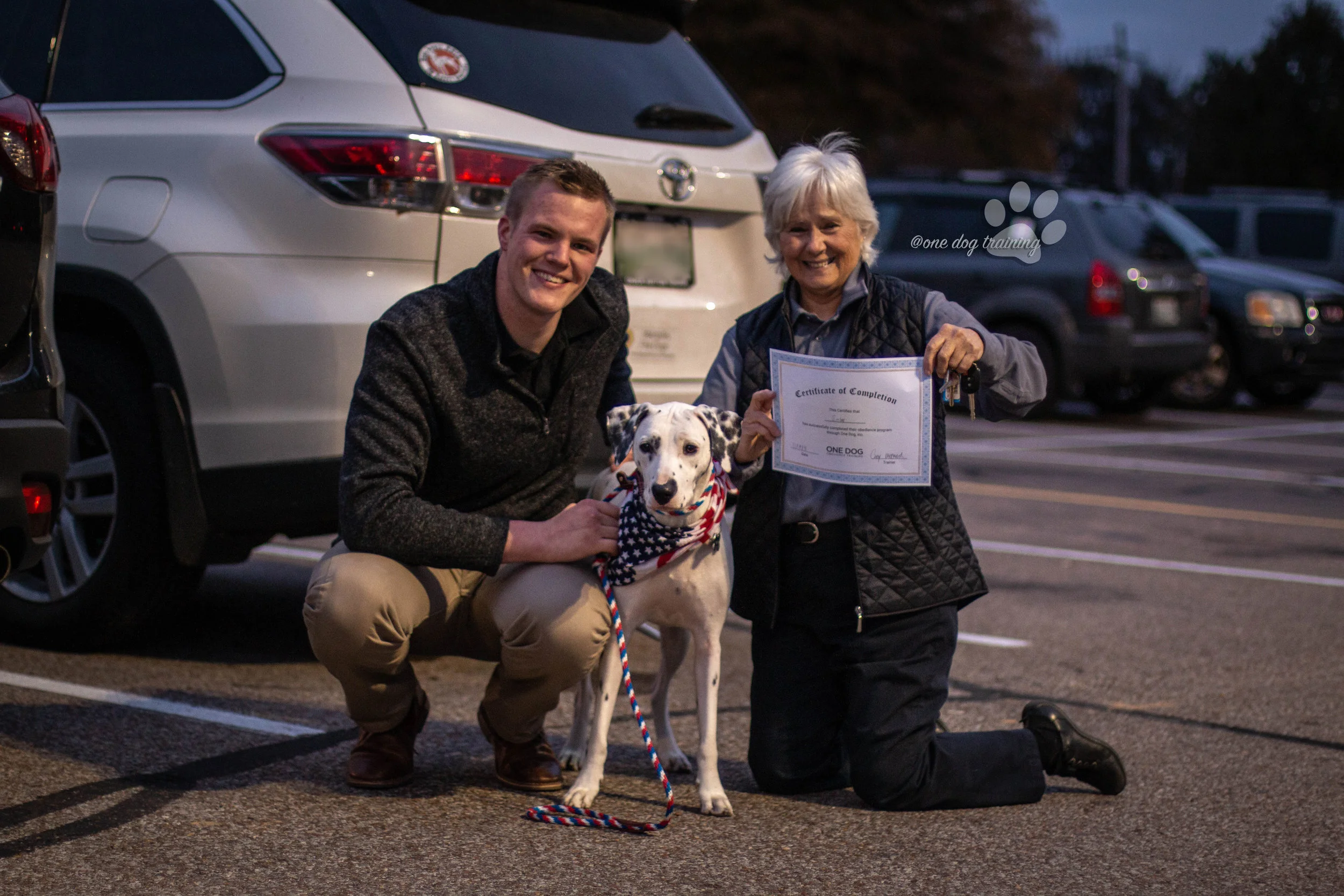 A happy client graduates from our obedience program.