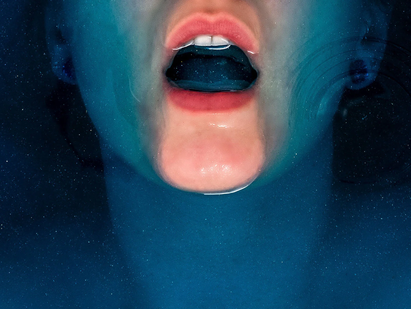  I can't tell if I'm drowning, or if I am just learning to hold my breath under water. Two weeks since the shut down began. Isolation self-portrait, March 27, 2020. Laura Pedersen Photo 