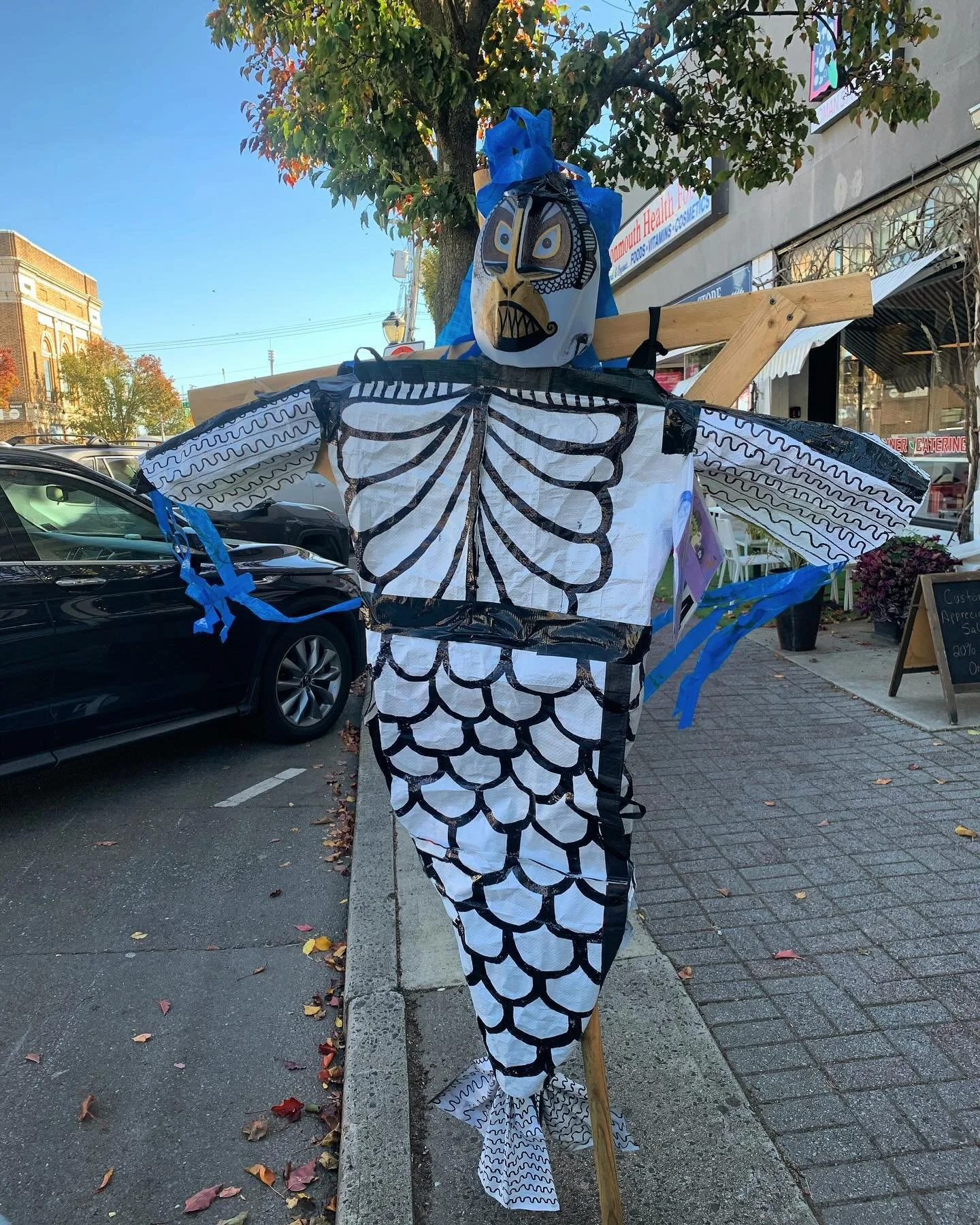 Welp, my sea siren scarecrow is hanging in there despite many windy days and it weighing like, all of a pound, as it&rsquo;s made out of plastic bottles and reusable bags 🫣🤞