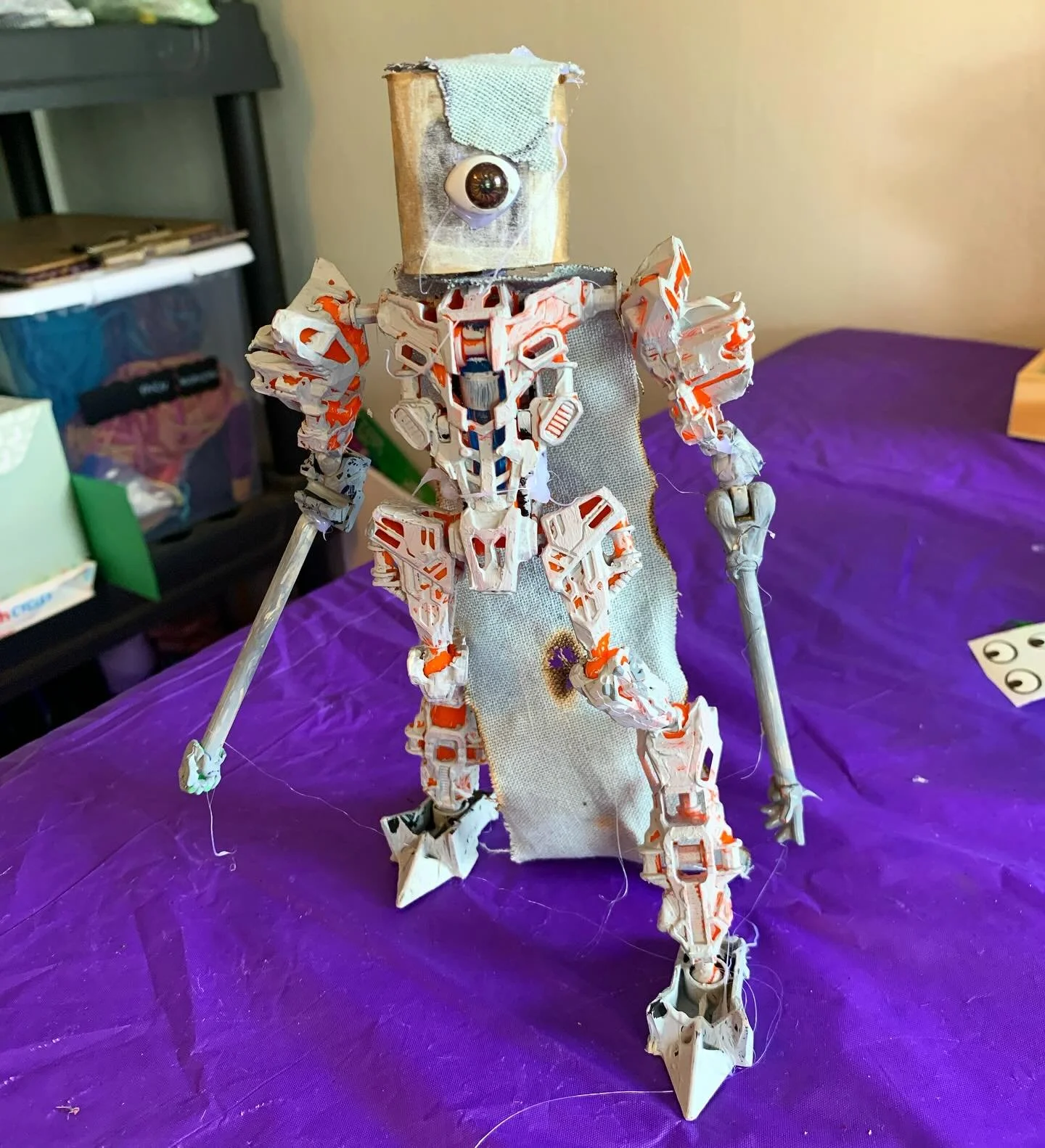 New monster prototype, created by using parts from 5-6 deconstructed toys/dolls, wood, fabric, cardboard, and paint. And yes, that blue fabric cloak is actually singed 🔥 I legit didn&rsquo;t touch a thing on this except to burn the linen for the cre