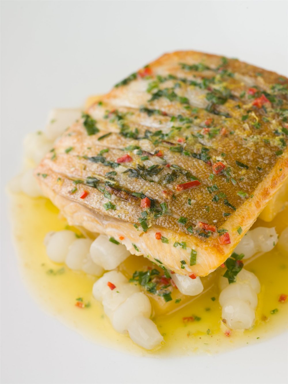  Arctic char over crosnes (Chinese artichokes) in lemon butter, at  Araxi .  John Sherlock | Courtesy Toptable Group  
