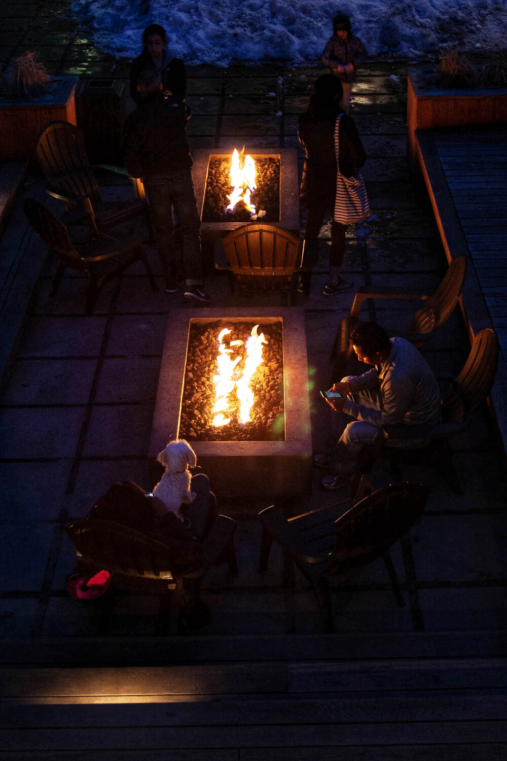  Relaxing around the fire pit at the Coachman Hotel in South Lake Tahoe, CA.  © Ski Travel Go  