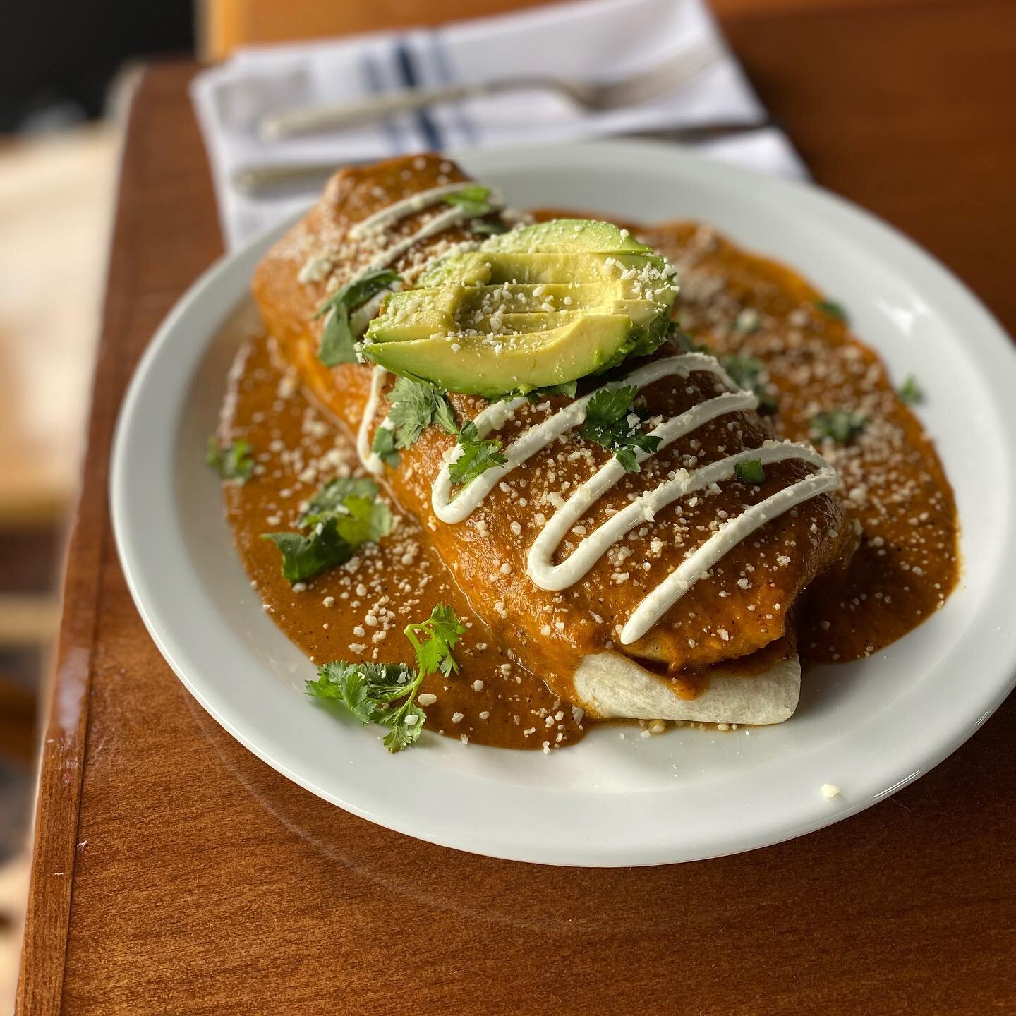 Breakfast burrito with green chili gravy.