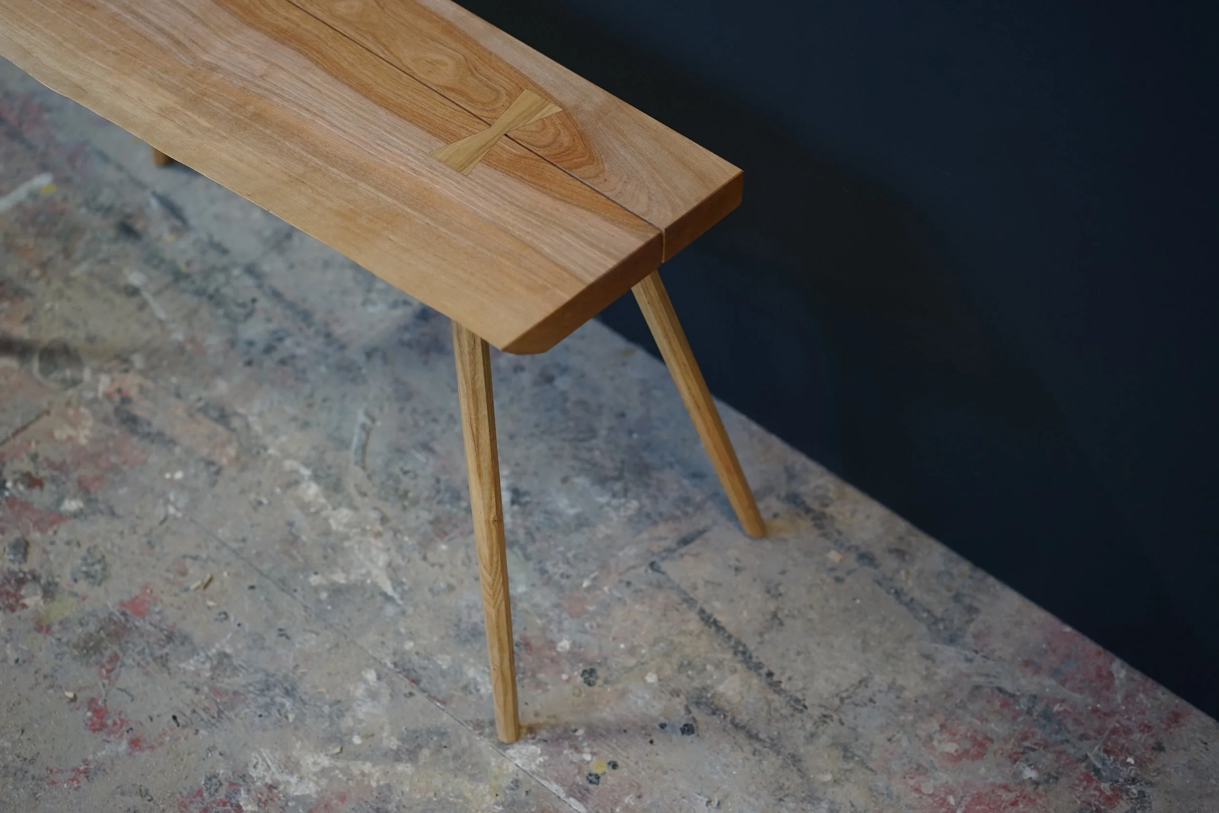  It has an intentional gap on its top, which is held together by the butterflies.  