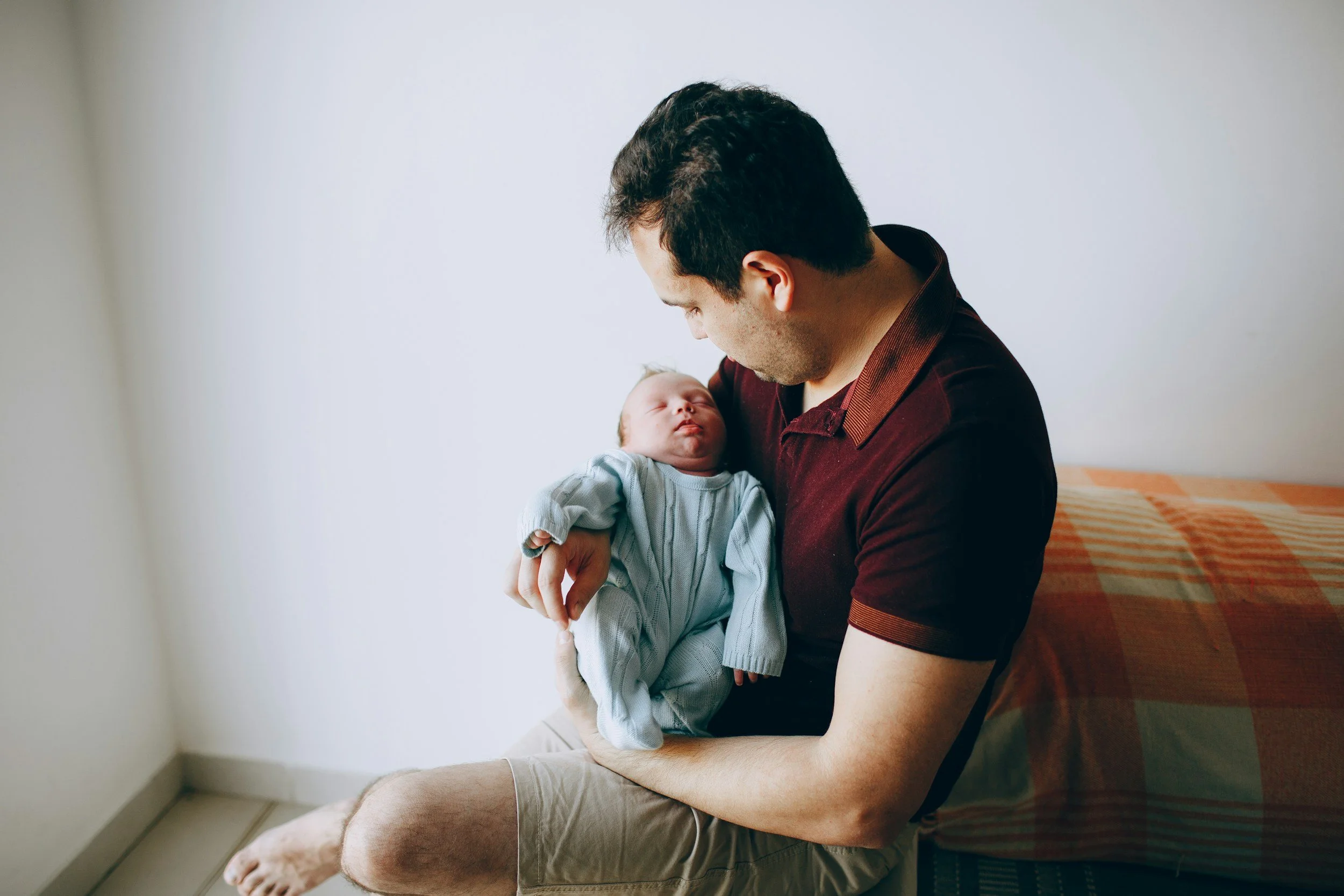 As a gay dad, how can I make sure my new baby gets the benefits of breast milk?