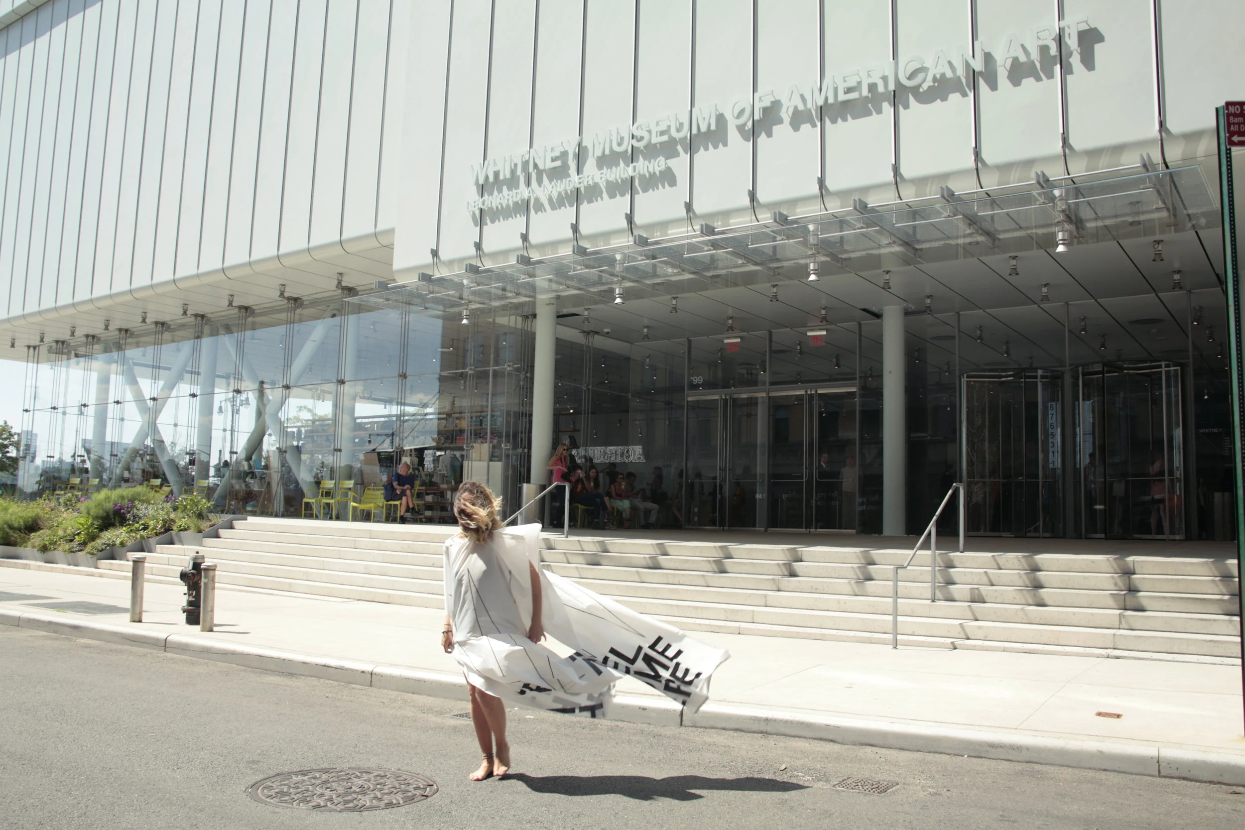Feel Home Here; Feel Local Here, Feel New York Here. Performance at the entrance of the Whitney Museum of American Art, New York.2018