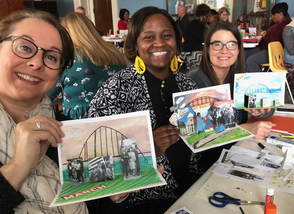 Participants in Bicentennial Workshops create pop ups depicting the Selma to Montgomery March.