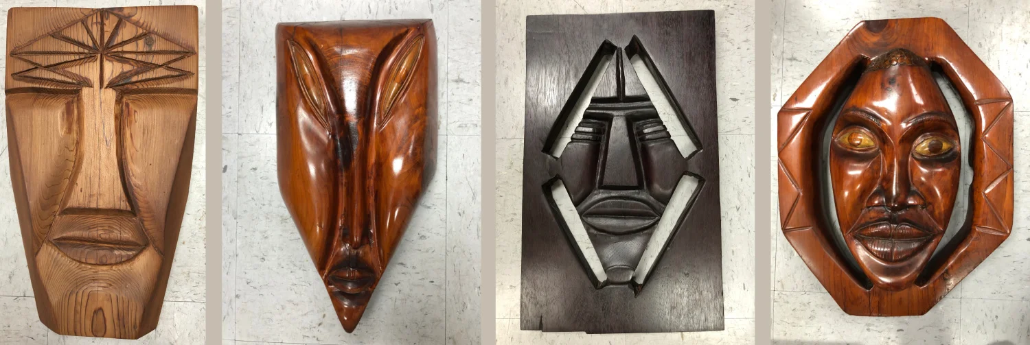 Carved masks by Featured Artist, Homer Johnson
