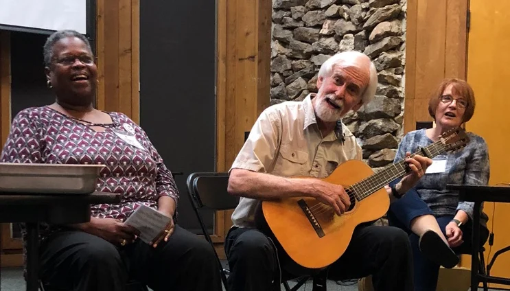 Nationally renowned musician, Bobby Horton, jams with the talented Jacquelyn Denson (SAIL 2018), while facilitator, Nancy Brown, looks on and records the session.