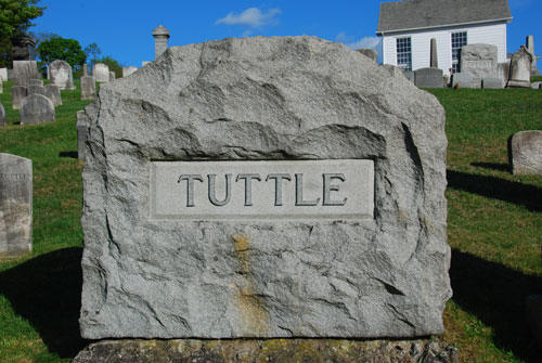 This is a fine example of a family plot, a creative rough-hewn carving. The significance of cemetery plots is shared by almost all cultures going back thousands of years. For Christians living in Rome, cemeteries served a spiritual function and special ground was set aside as holy just for the burial of remains. Today, cemeteries next to a church continue that tradition.
