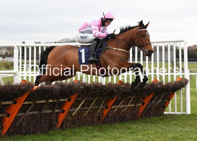 Midnightreflection jumping the last to win at Wetherby under Bryan Carver