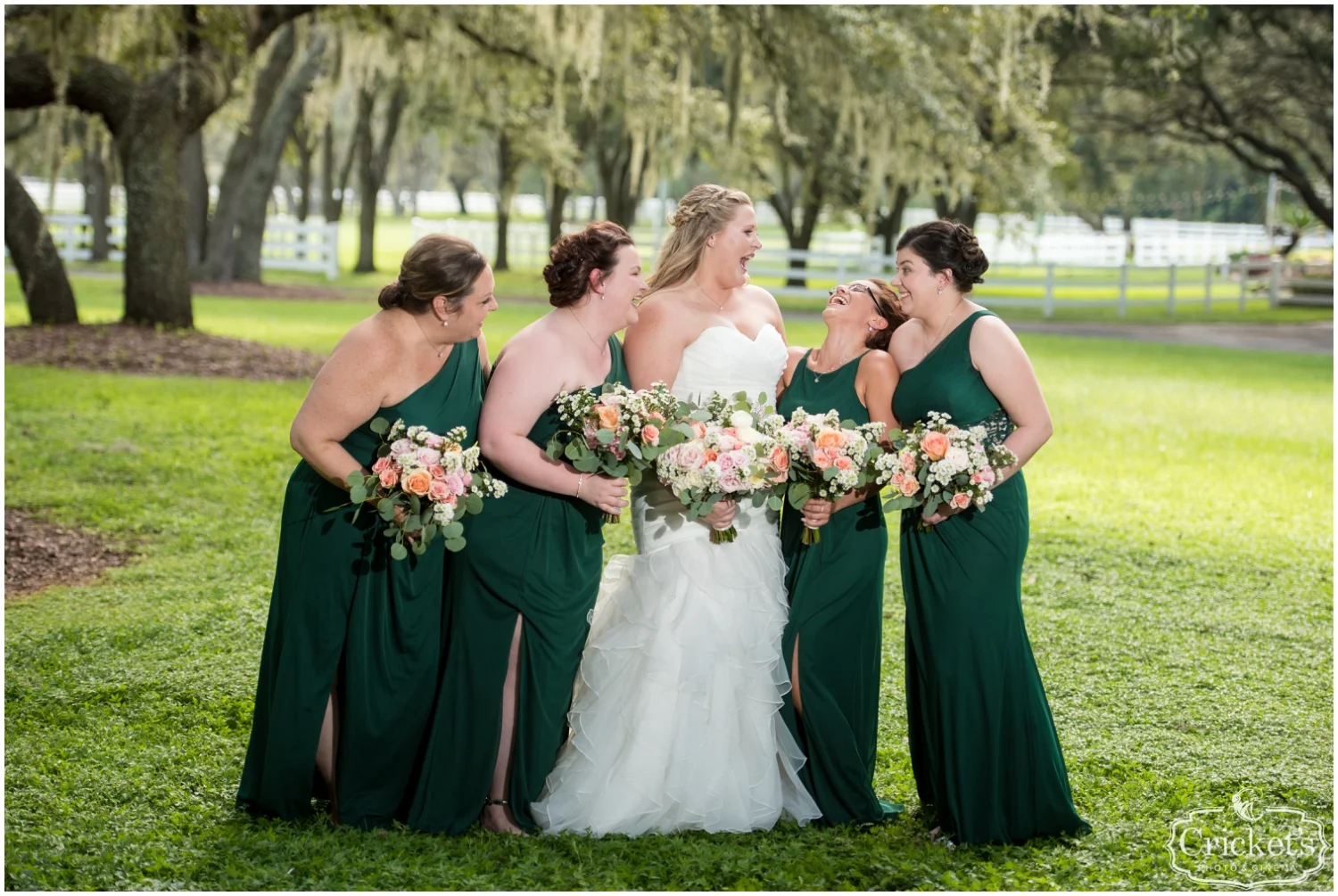 Bride and her bridesmaids holding bouquets