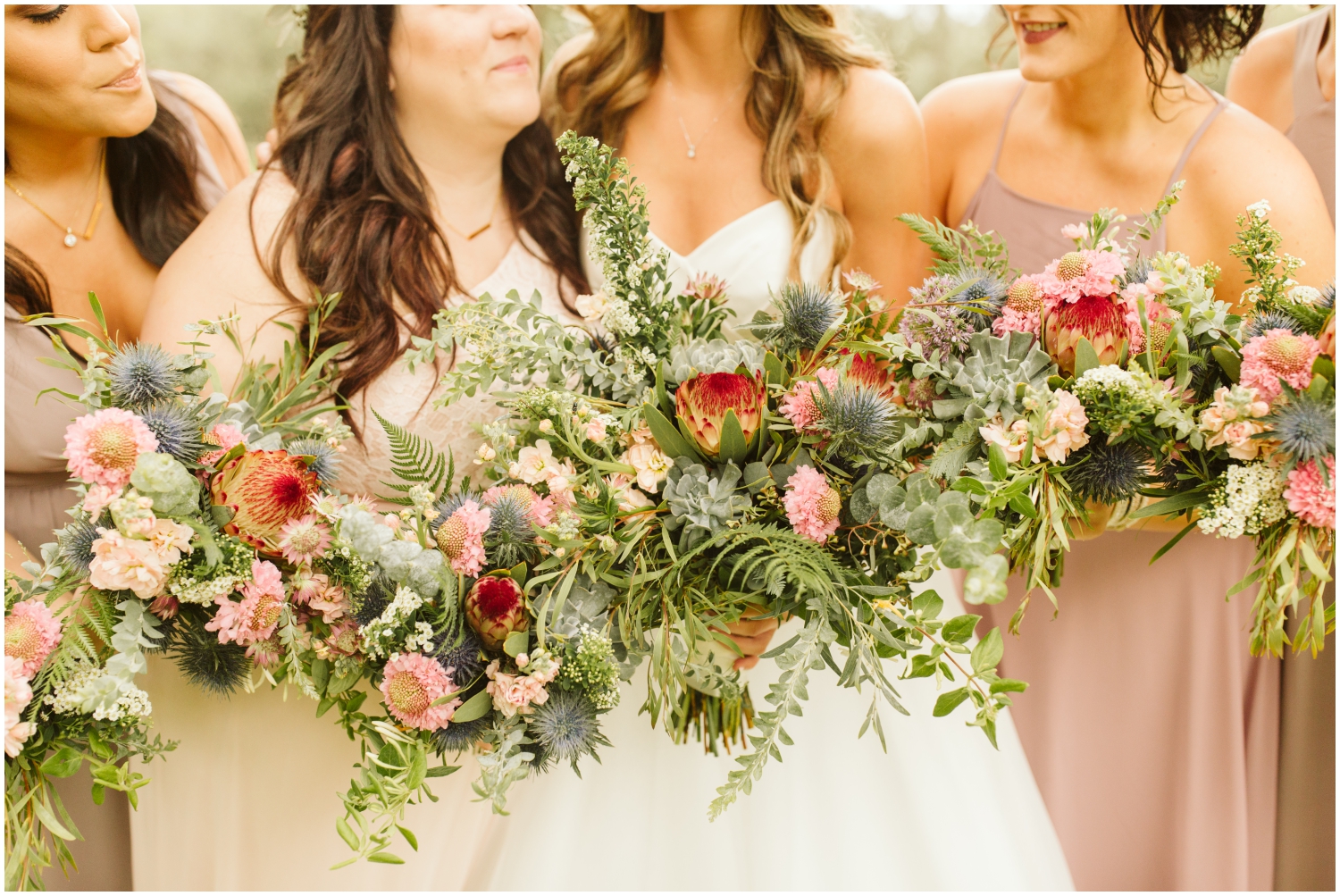 Bridesmaids and bride greenery wedding bouquets