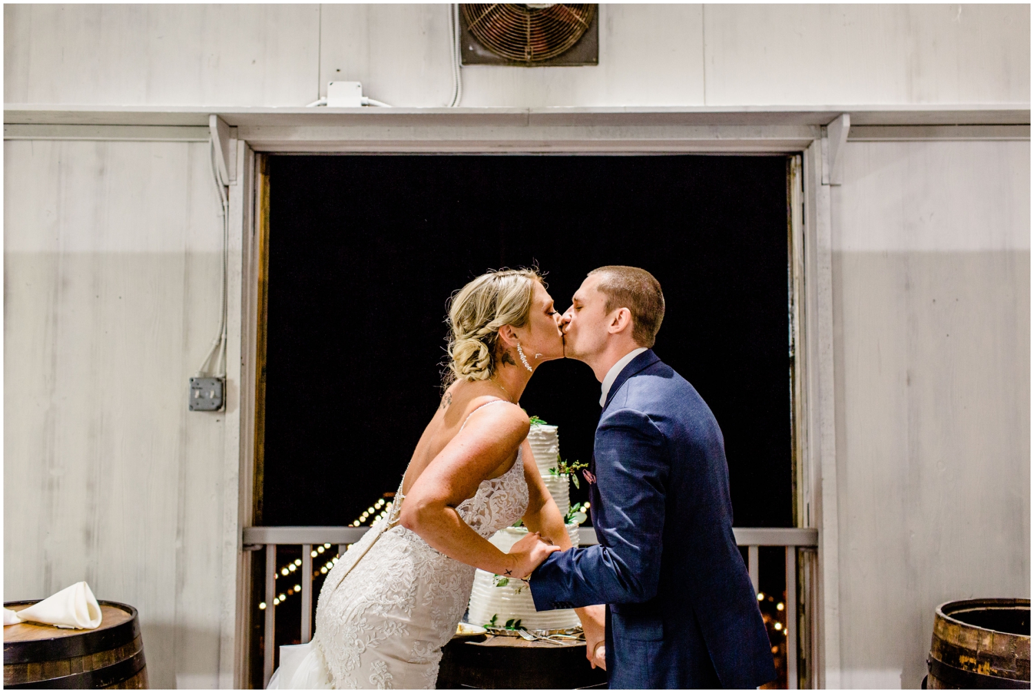Bride and groom cut the cake