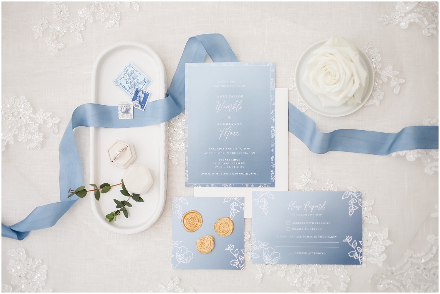 Wedding invitation and wedding rings