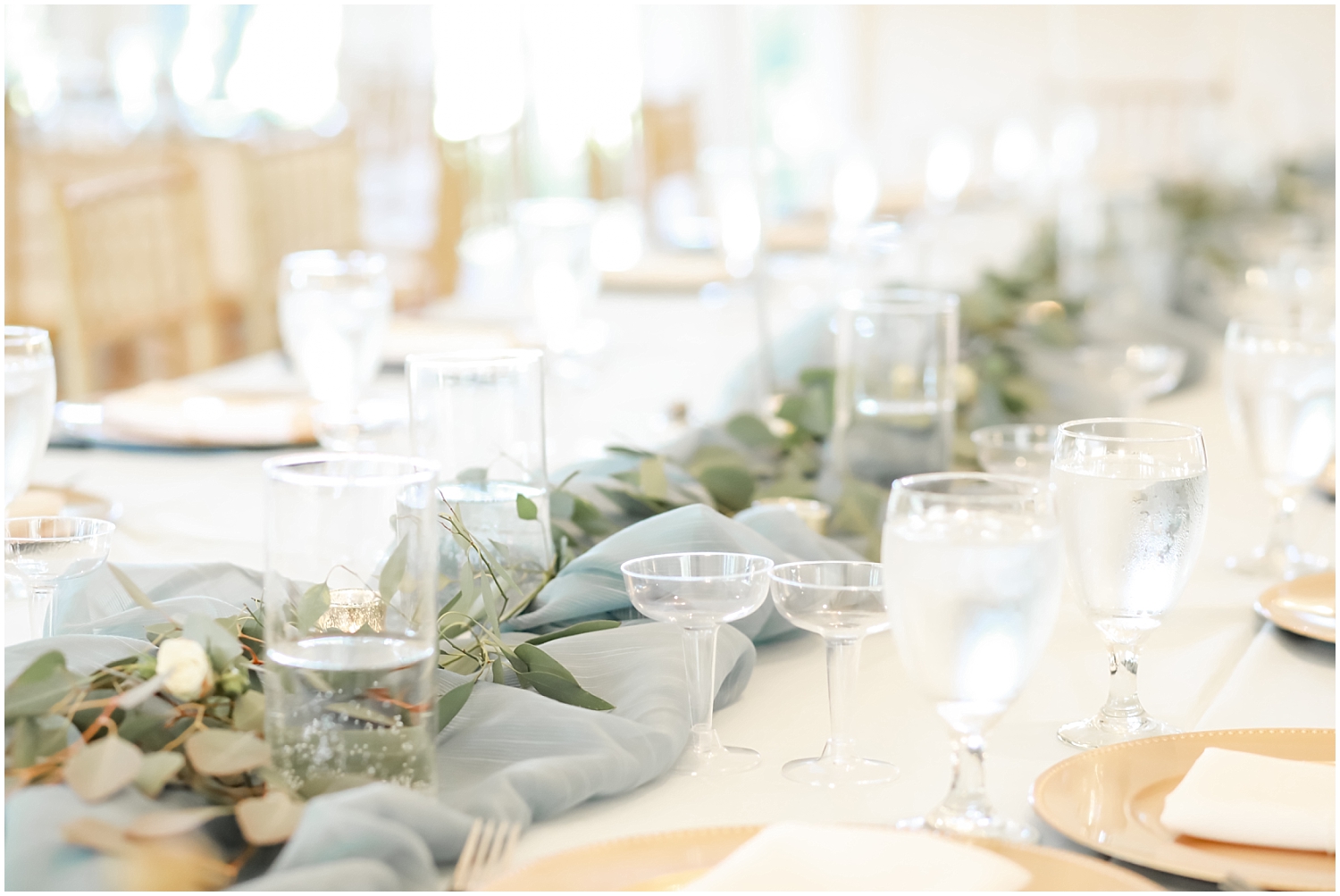 greenery and baby blue wedding centerpiece