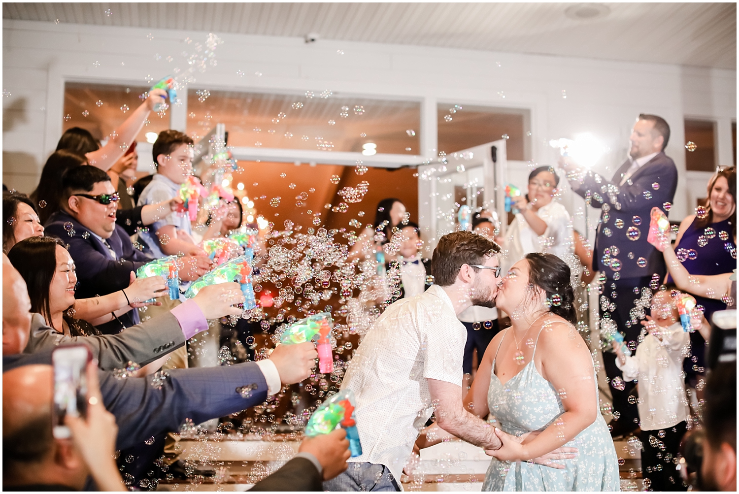Grand exit with bubbles for the couple