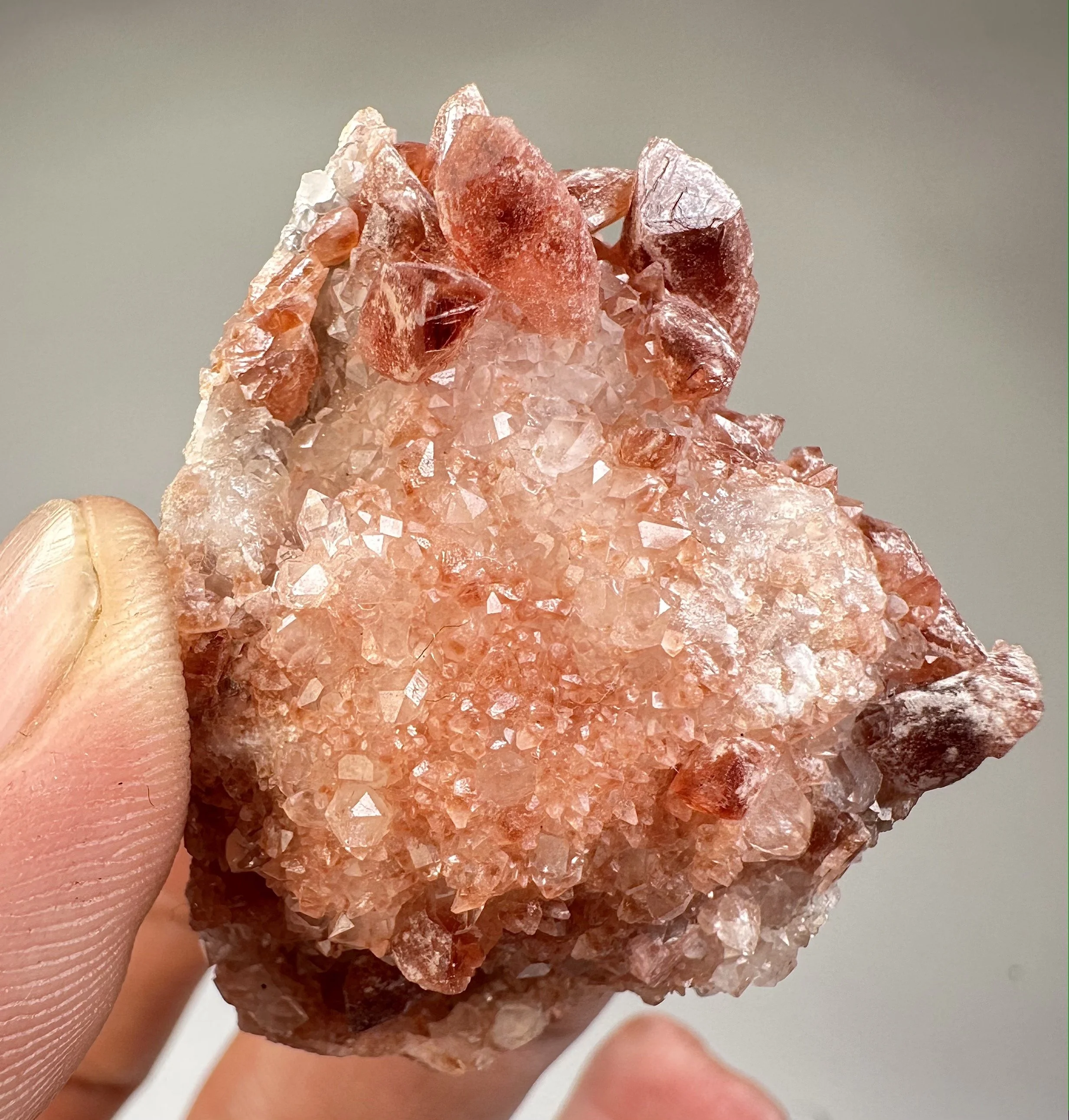 Rhodochrosite on Quartz, Peru.JPG