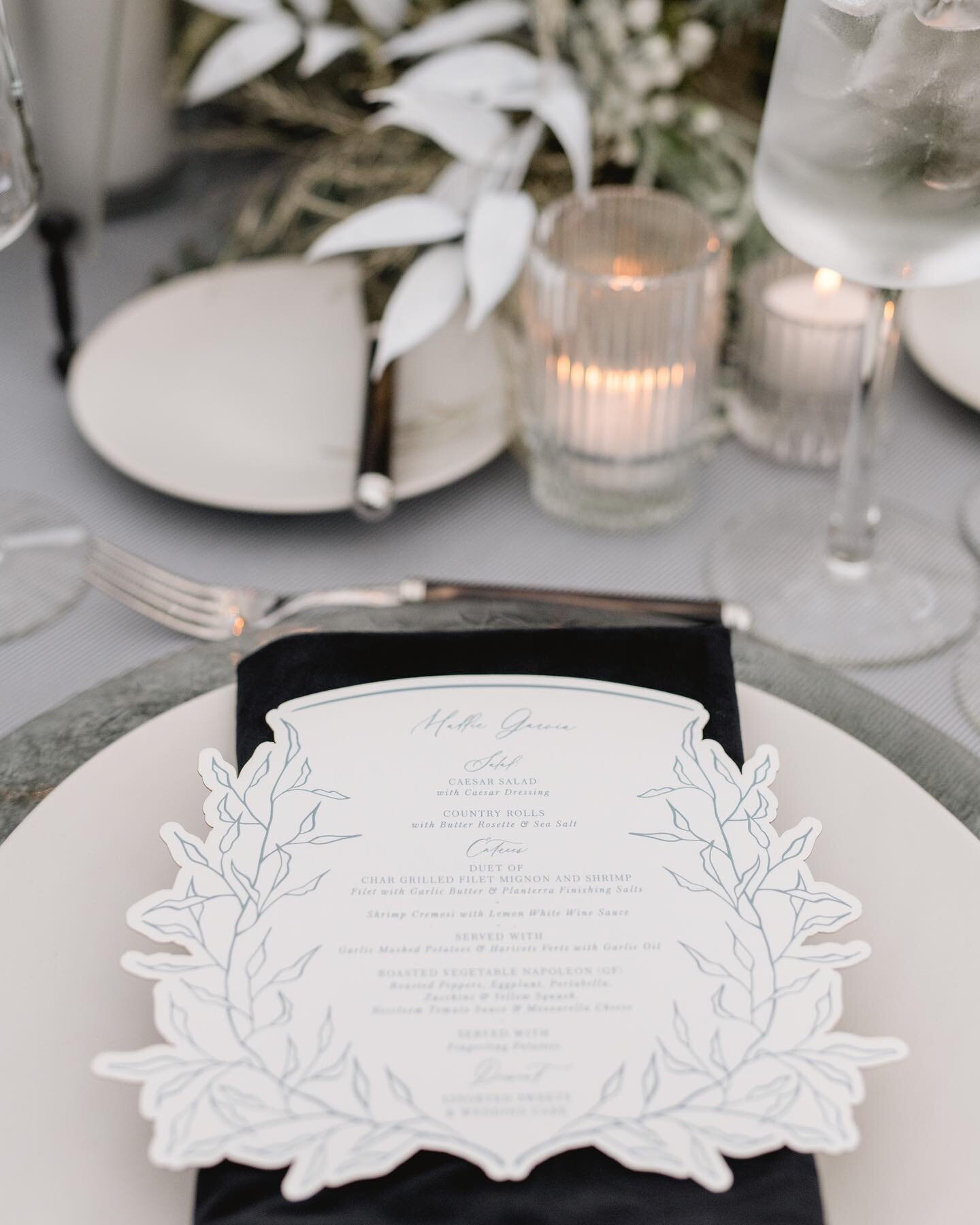 The die-cut menu of DREAMS for A &amp; G&rsquo;s winter wedding. We wanted the whole day to feel like winter, without being overtly winter themed. 
.
.
.
We designed a &ldquo;snowy day&rdquo; inspired place setting with grey pinstripe custom linens, 