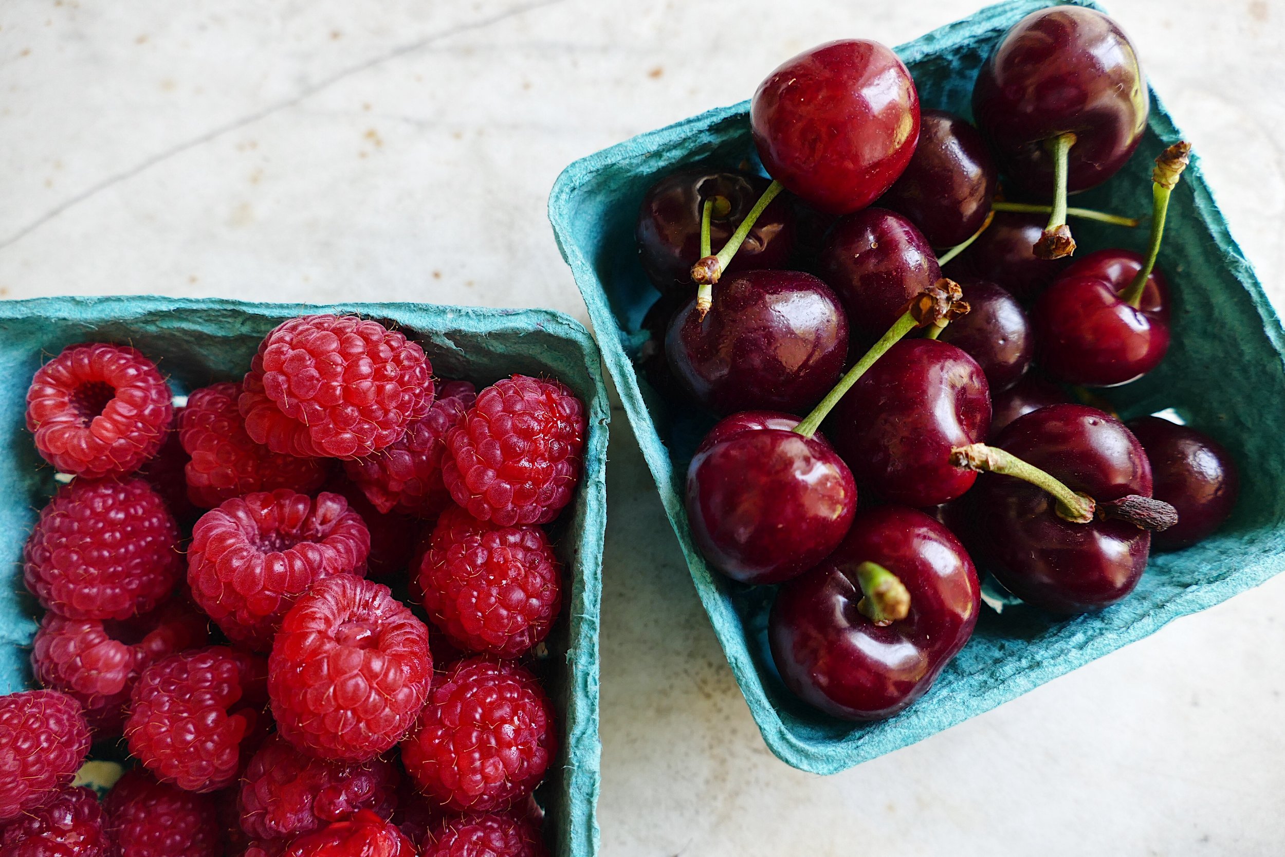 Baskets of Raspberries and Cherries