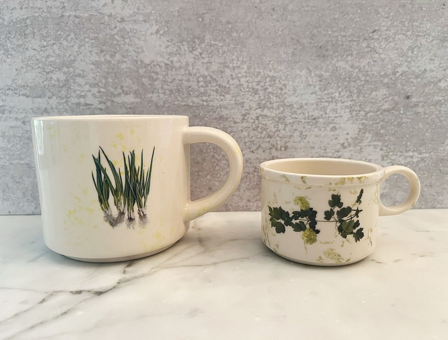 KTH Kitchen Ceramics 

New espresso cup available. Mug on the left for scale. Super excited for this new item. I made a couple and ready to dive in to a bunch now. Love the image on this one that is repeated twice around the cup. A vine of viburnum w