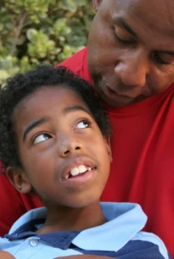 Dad and son; treat language processing disorder at Canto Speech Therapy Online