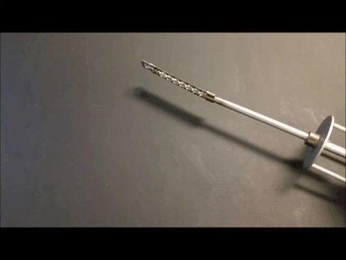 This compliant directional bone surgery tool was developed for the University of Michigan Office of Medical Research. The low cost stamped carrier conforms to the bone curvature to more easily remove cartilage layers.